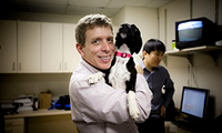 Dr. berns holding dog